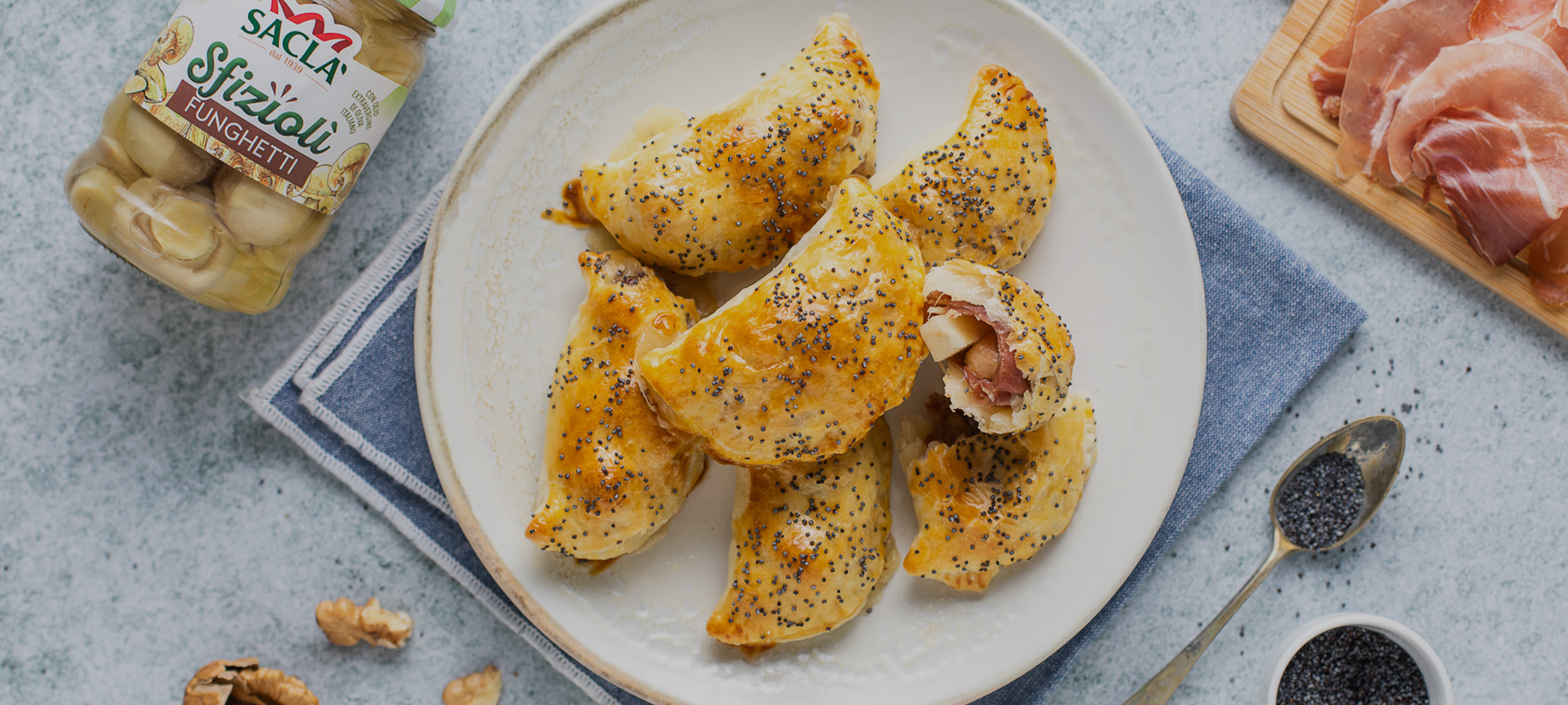 Fagottini di pasta sfoglia con speck, fontina e Funghetti