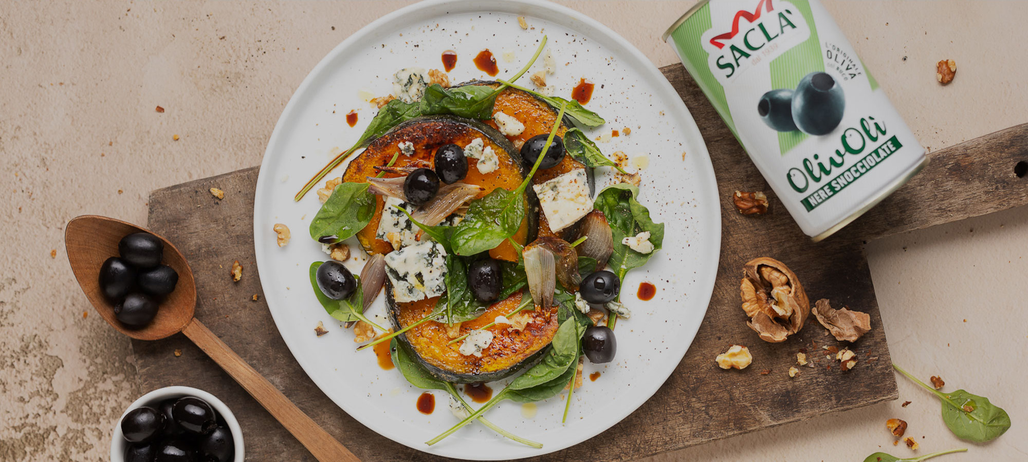 Insalata di zucca al forno con Olive Nere Snocciolate, gorgonzola stagionato e noci